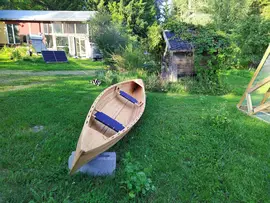 A Vendia canoe in the yard at Beyond Buckthorns