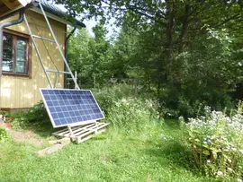 Solar panel being moved onto the roof