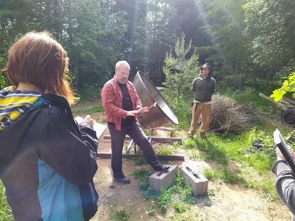 Explaining the charcoal making process