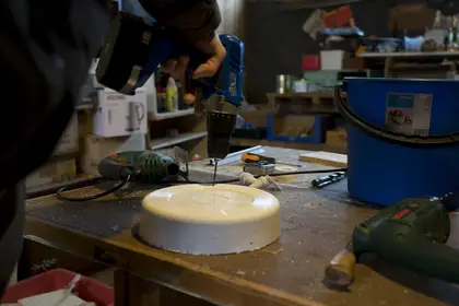 Drilling holes into the cut bucket - creating a sieve