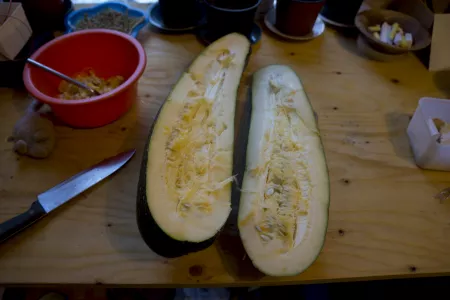 Cutting Zucchinis in half Cutting Zucchinis in half