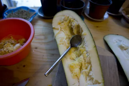 Removing the flesh out of the Zucchini Removing the flesh out of the Zucchini