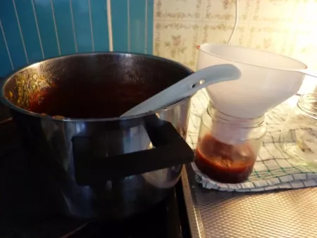Filling the jam to jars Filling the jam to jars